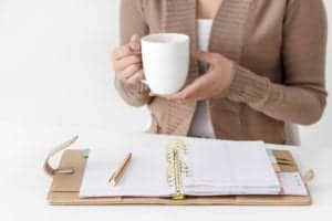 Woman working out budget goals