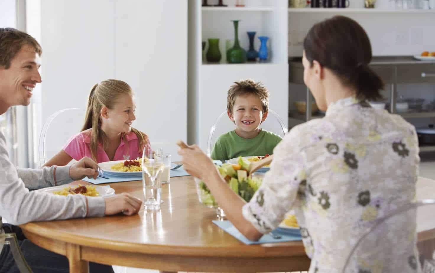 family enjoying budget slimming world meal together