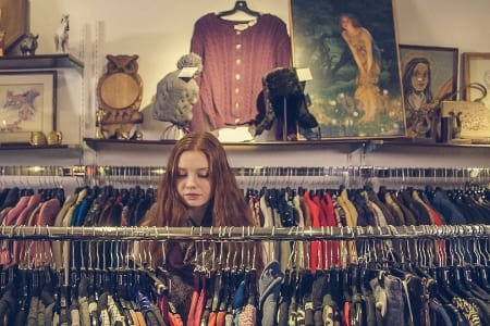 woman browsing clothes rail