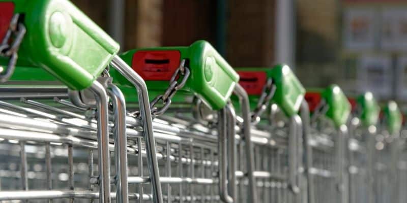 Row of empty chained together shopping trolleys